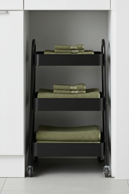 Slim 12-inch-deep rolling cart fitted into a narrow gap between a white cabinet and wall