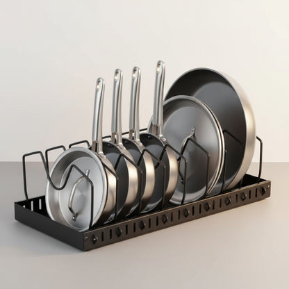 Stainless pans stored upright and separated in the organizer's divided compartments