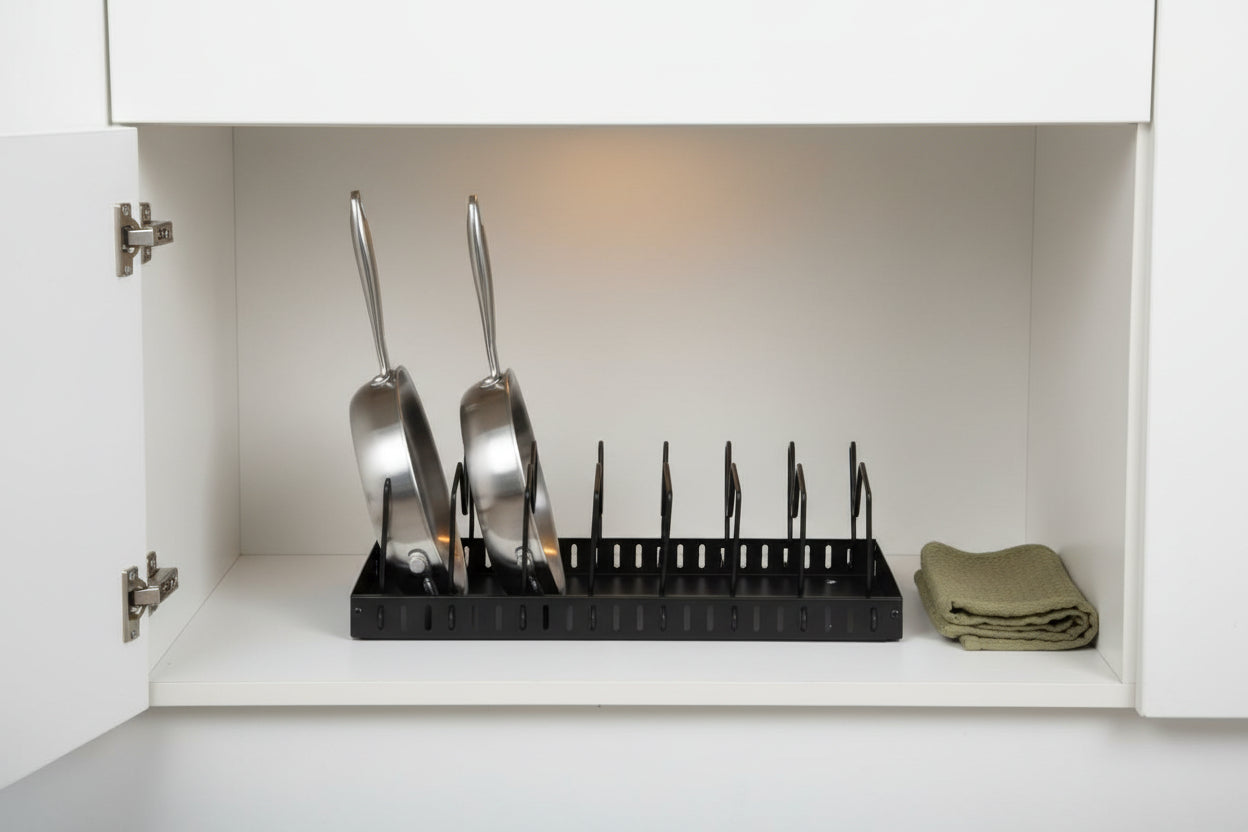 Close detail of the metal frame joints and divider edges on the pan organizer
