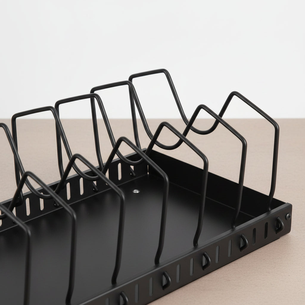 Under cabinet pot and pan organizer seated closed in the cabinet space holding pans