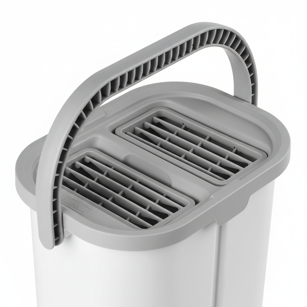 Dual chamber bucket lid showing separate wet and dry wringer plates with ridged scraper teeth