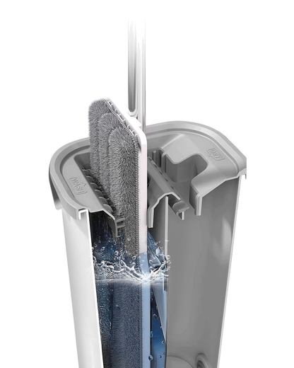 Cut-away of the mop bucket wet chamber, scraper teeth pulling dirt off the microfiber pad in the water