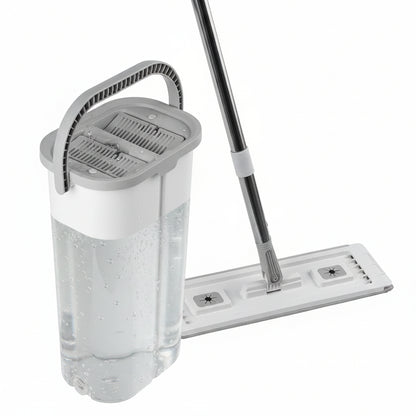 Flat mop head lowered into the wet chamber against the scraper plate with water in the bucket